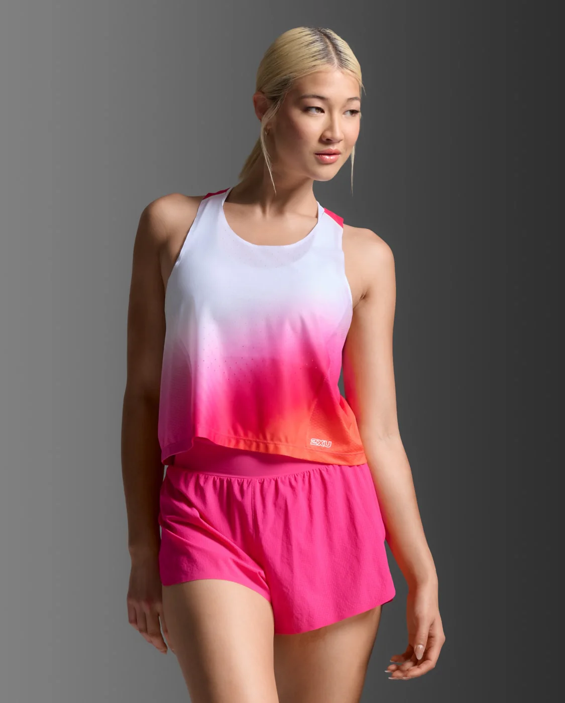 2XU Women Light Speed React Crop Singlet - Fuchsia Grad / White Reflective - Image 3