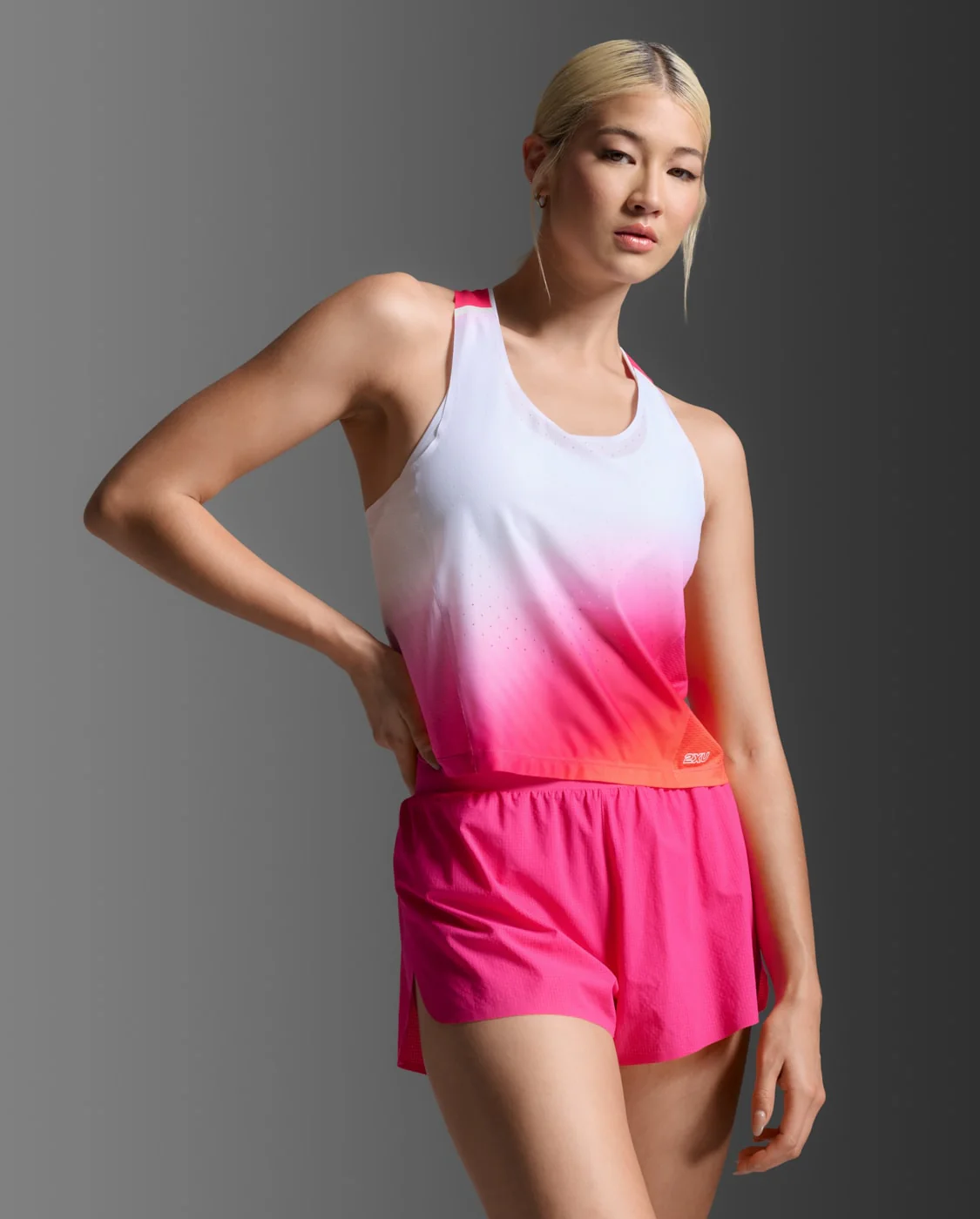 2XU Women Light Speed React Crop Singlet - Fuchsia Grad / White Reflective - Image 4