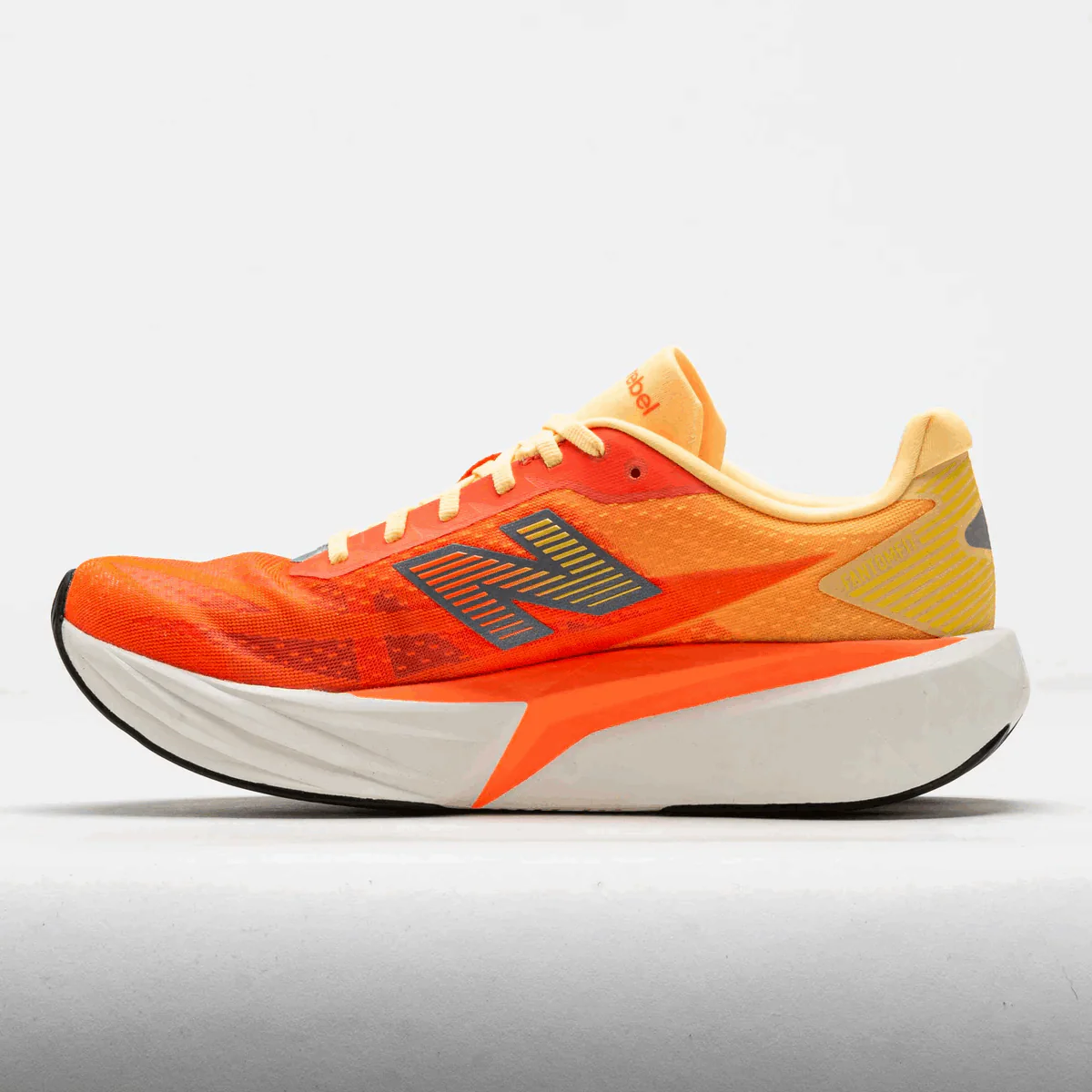New Balance Men FuelCell Rebel V5 - Tangerine Heat / Silver Metallic - Image 4