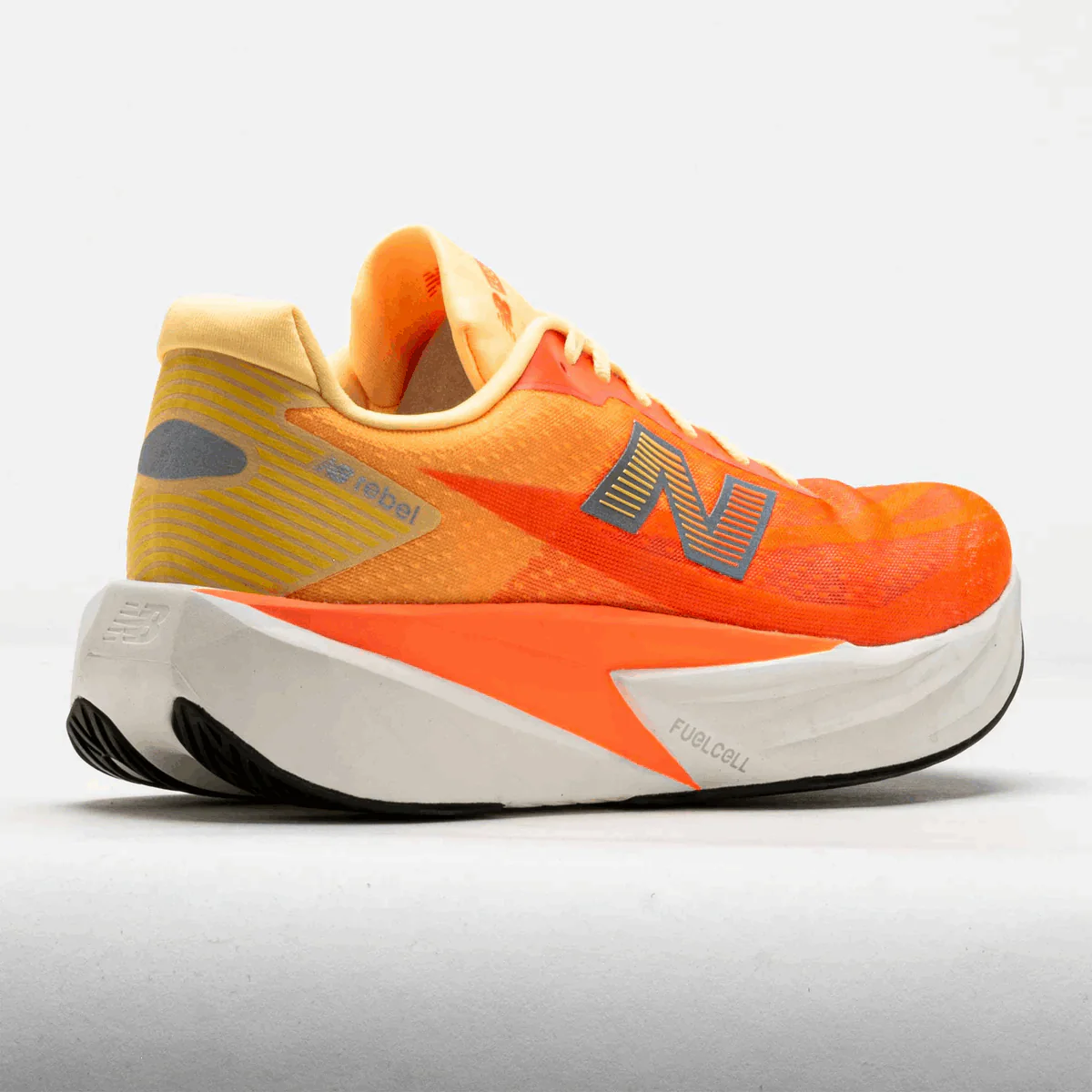 New Balance Men FuelCell Rebel V5 - Tangerine Heat / Silver Metallic - Image 5